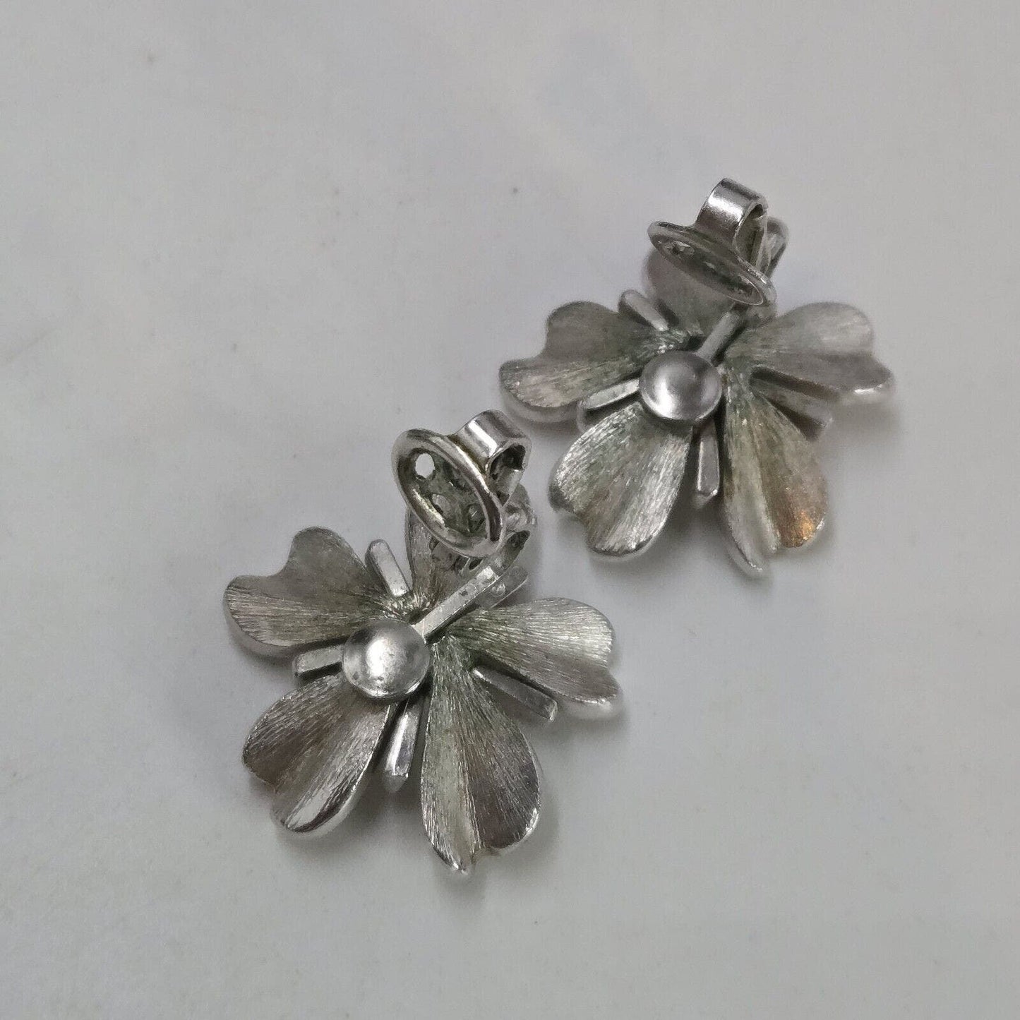 Vintage Crown TRIFARI Matte Silver Tone Dogwood Flower Clip On Earrings