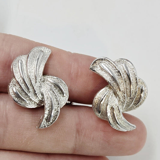 Vintage Coro Silver Tone Textured Swirling Wave Leaf Clip On Earrings