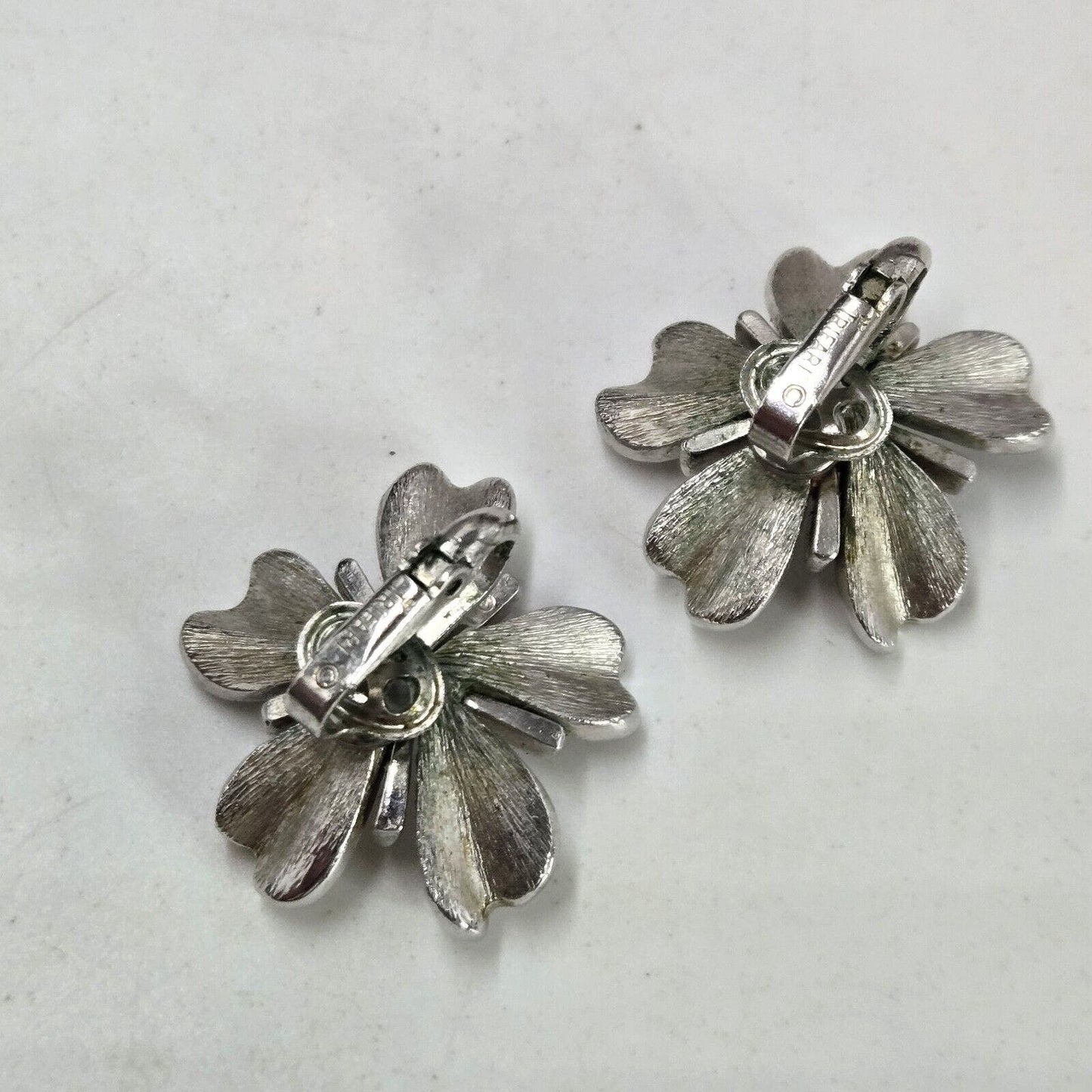 Vintage Crown TRIFARI Matte Silver Tone Dogwood Flower Clip On Earrings