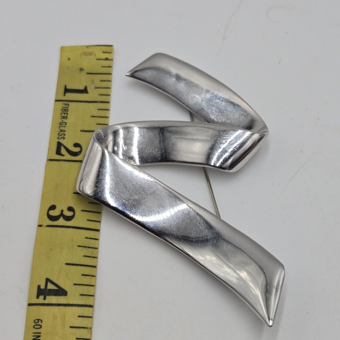 Vintage Monet Modernist Ribbon Oversized Shiny Silver Tone Vintage Brooch Pin