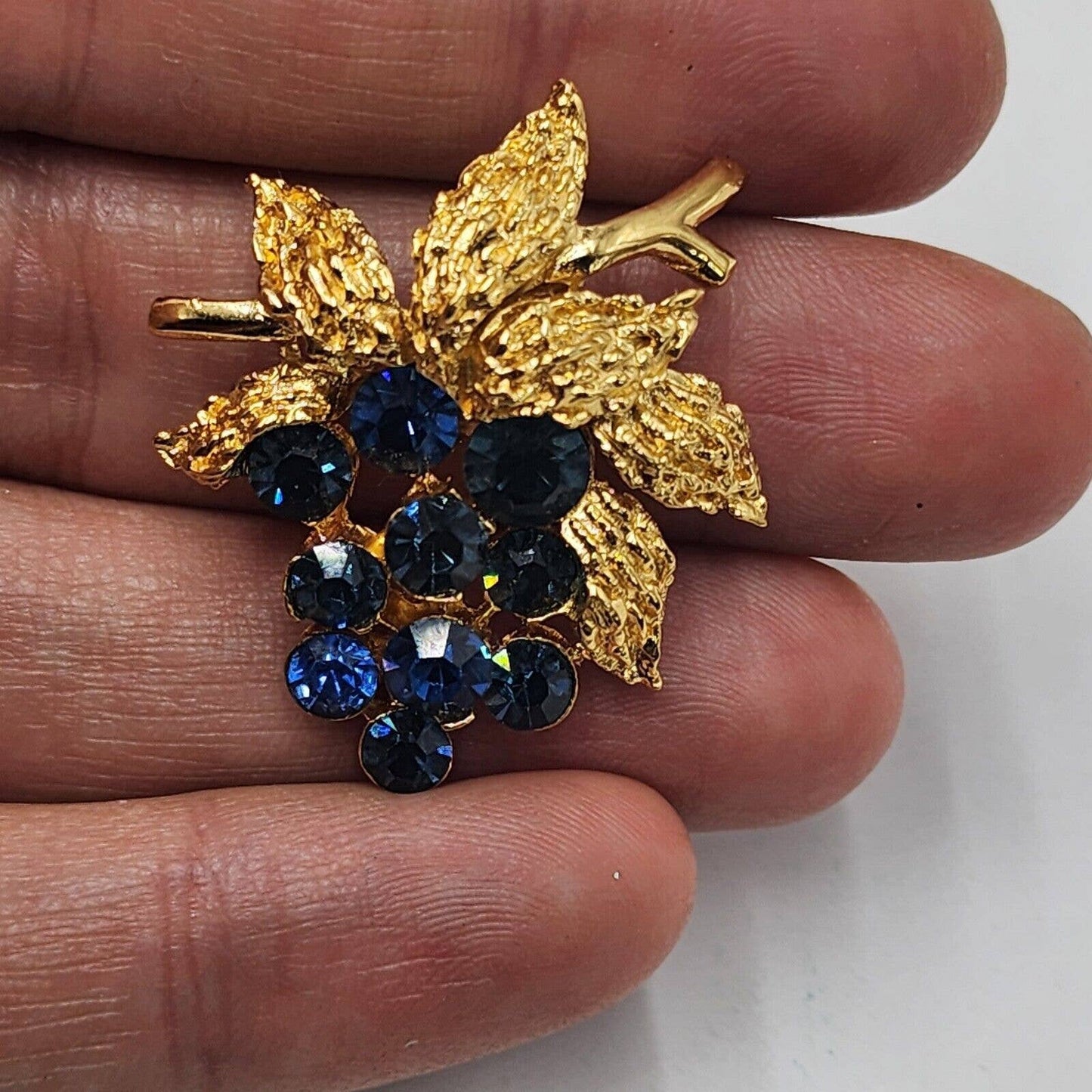 Vintage CROWN TRIFARI Blue Sapphire Rhinestone Grapes Gold Tone Brooch Signed