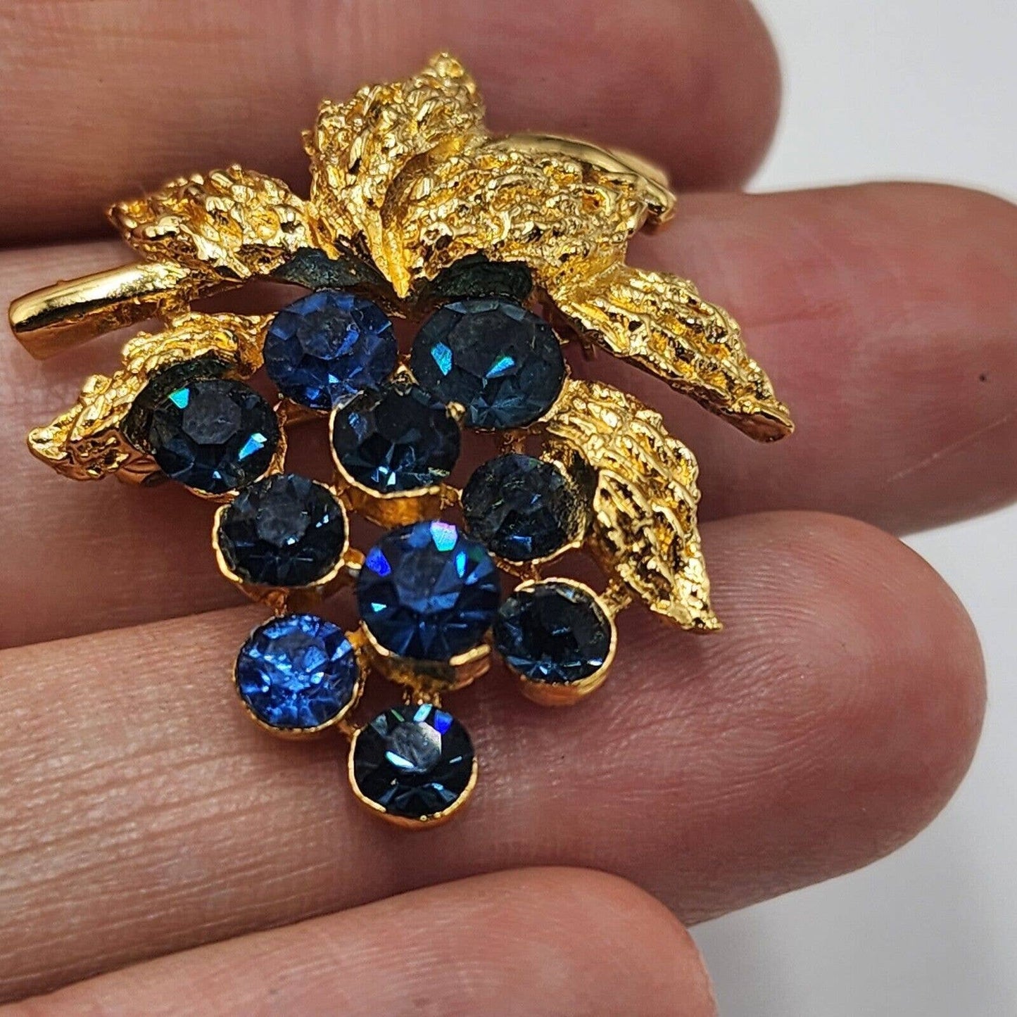 Vintage CROWN TRIFARI Blue Sapphire Rhinestone Grapes Gold Tone Brooch Signed