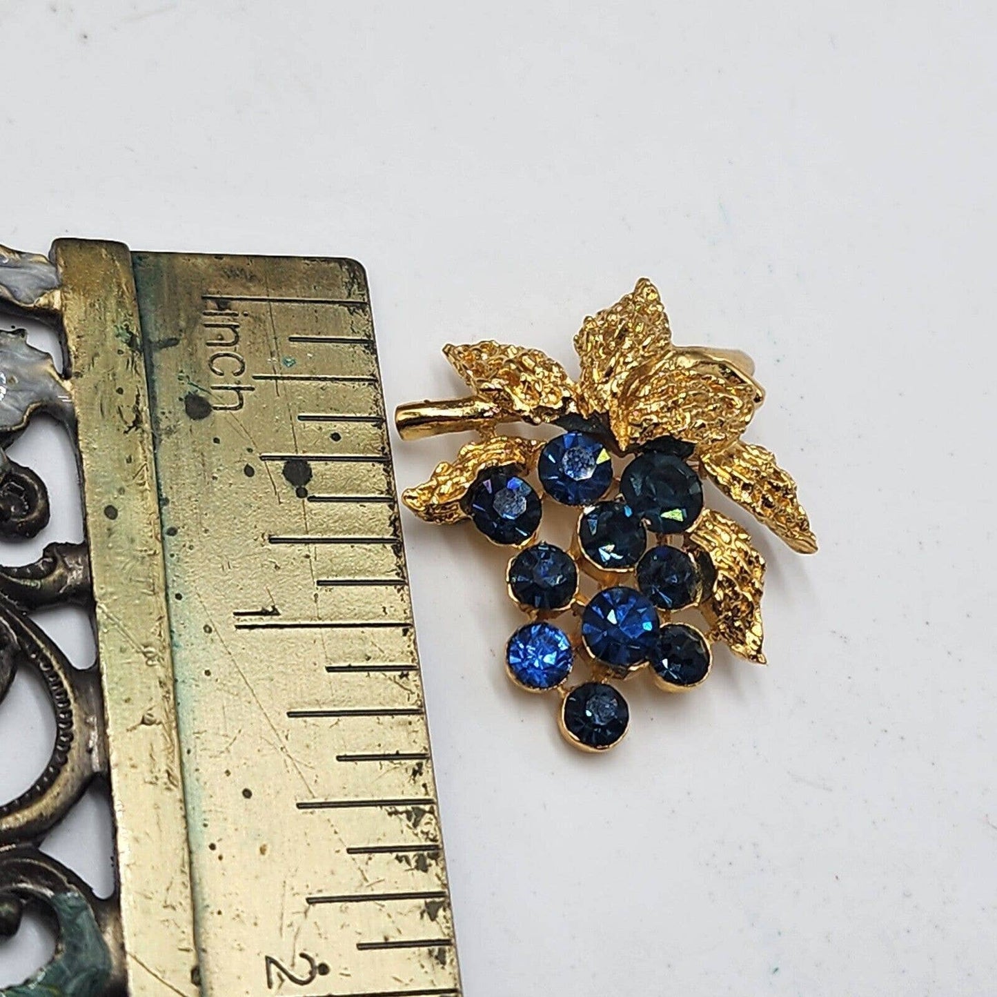 Vintage CROWN TRIFARI Blue Sapphire Rhinestone Grapes Gold Tone Brooch Signed